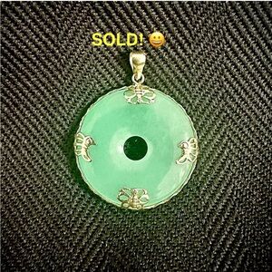 Jade pendant surrounded by 14k gold butterflies 🦋
